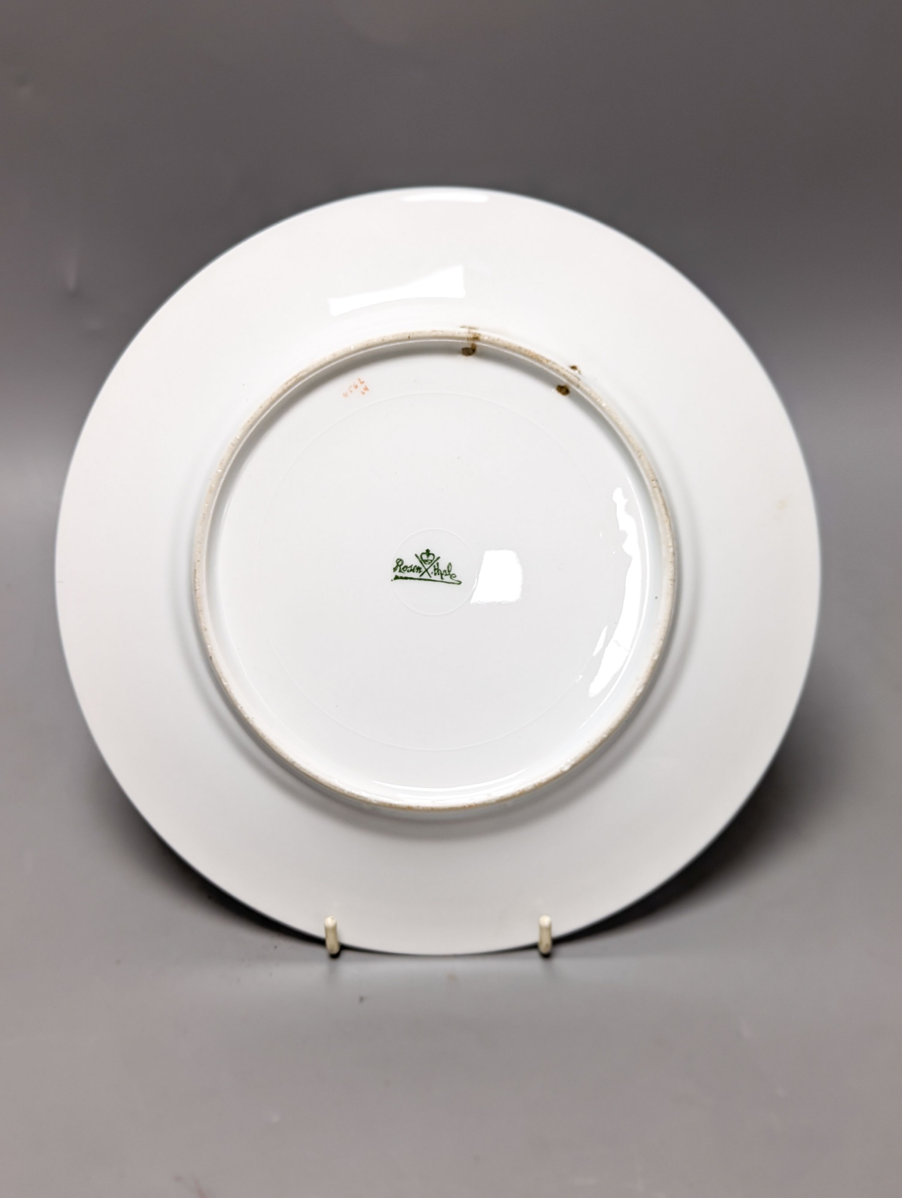 A Rosenthal painted porcelain portrait plate, early 20th century and a Royal Crown Derby gilded pheasant plate 26cm